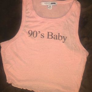 I am selling a cute 90’s baby top it’s perfect with a sweater I think.